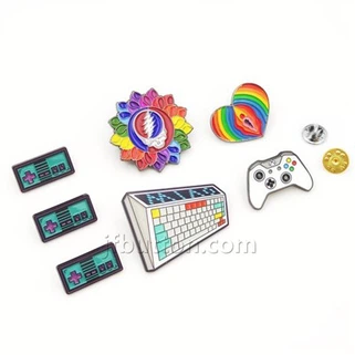 Tlysau A Phinnau'r Wyddor