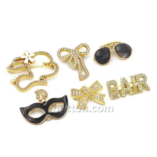 Tlysau A Phinnau Ar Gyfer Ffrogiau