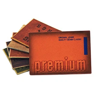 Label lledr pu boglynnog