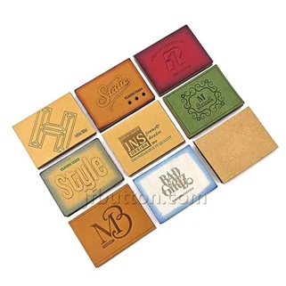 Tagiau lledr ar gyfer gwau