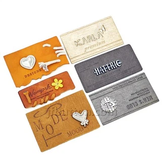 Tagiau lledr ar gyfer hetiau